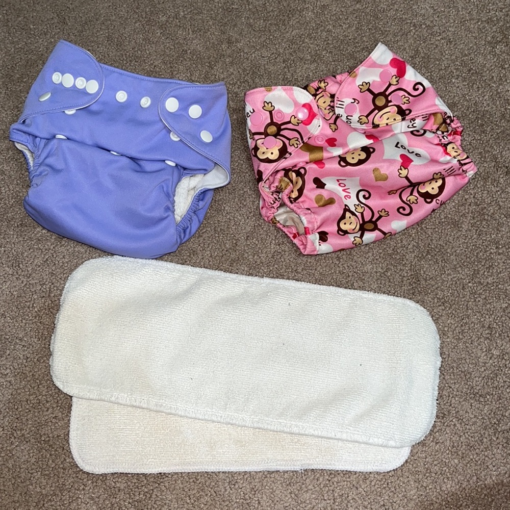 Cloth diapers w/ 2 waterproof covers and inserts